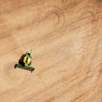 Background texture pattern of a combine finishing a field of lentils