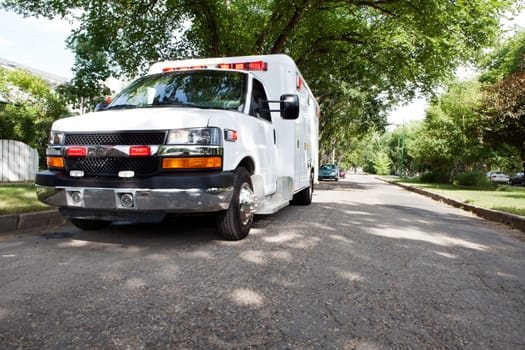 3/4 view of an ambulance parked in a residential area of a city
