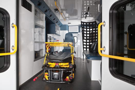 Interior of an empty ambulance with stretcher