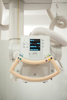 A vertical detail of an x-ray machine in a hospital