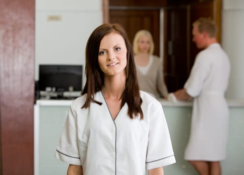 Portrait of a spa therapist in a reception interior