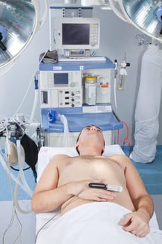 Patient lying sedated before the operation in hospital