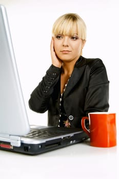 Sexy Beautiful Business women with laptop computer and coffee cup isolated on white