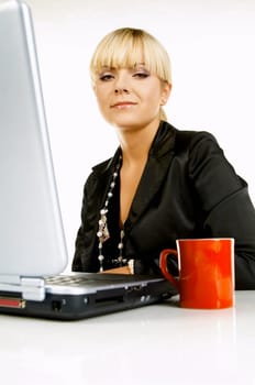 Sexy Beautiful Business women with laptop computer and coffee cup isolated on white