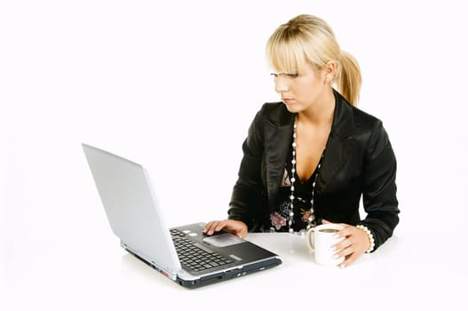 Sexy Beautiful Business women with laptop computer and coffee cup isolated on white