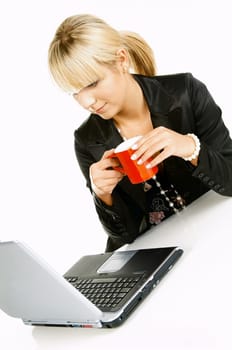 Sexy Beautiful Business women with laptop computer and coffee cup isolated on white
