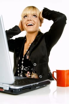 Sexy Beautiful Business women with laptop computer and coffee cup isolated on white