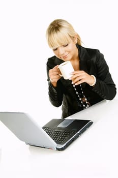 Sexy Beautiful Business women with laptop computer and coffee cup isolated on white