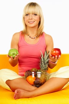 Happy beautiful women with fresh fruits
