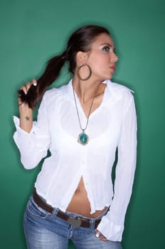 Beautiful and sexy brunette woman isolated on clear colour background
