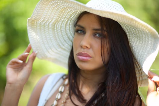 20-25 years old beautiful woman wearing hat, at outdoor