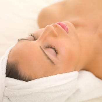 Portrait of beautiful woman during spa treatment