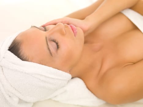 Portrait of beautiful woman during spa treatment