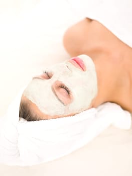 Portrait of beautiful woman during spa treatment
