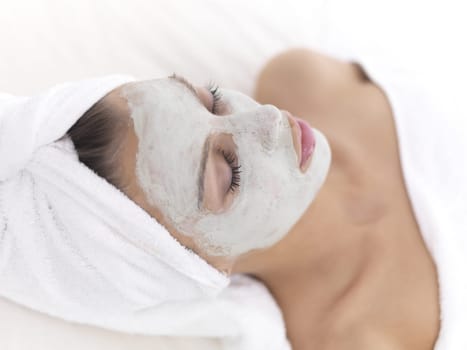 Portrait of beautiful woman during spa treatment
