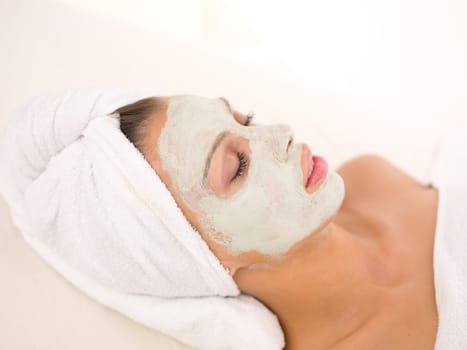 Portrait of beautiful woman during spa treatment