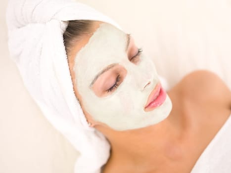 Portrait of beautiful woman during spa treatment