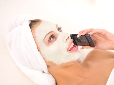 Portrait of beautiful woman during spa treatment