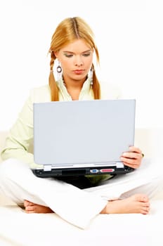 Sexy blonde busiess woman using laptop computer