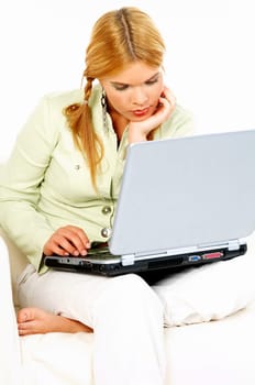 Sexy blonde busiess woman using laptop computer