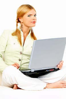 Sexy blonde busiess woman using laptop computer