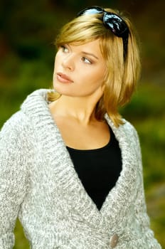 Beautiful woman portrait in autumn outdoors