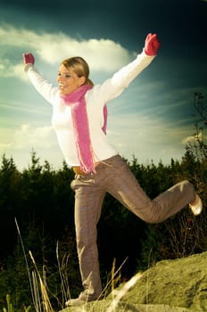 Young business woman relaxing in mountains outdoors