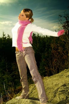Young business woman relaxing in mountains outdoors