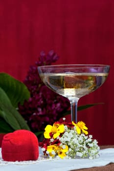 a arrangement with flowers and gift package