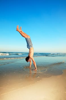 The man have a fun time on the tropical beach