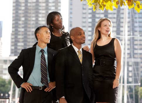 A business team looking to the side or into the distance