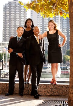 A business team portrait in an outdoor setting