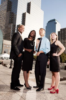A group of business people looking out of the frame - future concept