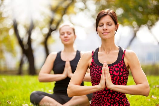 Meditation in the a park on a warm summer day