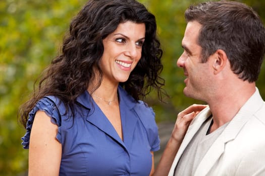 A woman looking happy at her husband / boyfriend - Focus on the woman