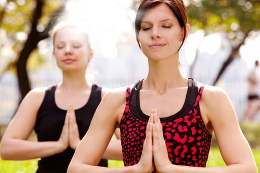 Meditation in the a park on a warm summer day