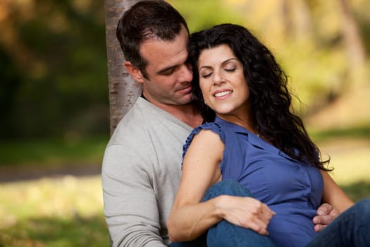 A married couple in the park relaxing
