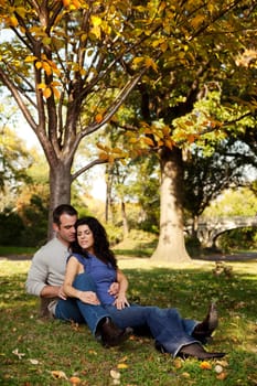 A couple relaxing in the park - spending time together