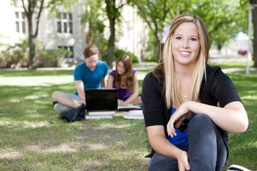 Portrait of a young student outdoors on campus