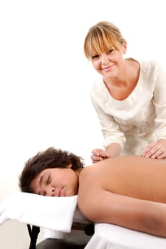 Portrait of a young male receiving acupuncture treatment