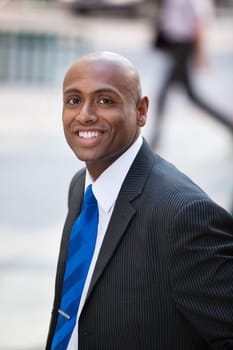 Close-up portrait of a smiling African American business man