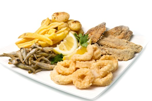 a dish with different fish fried and potate