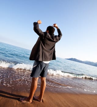 A business man with outstretched arms - freedom, success concept