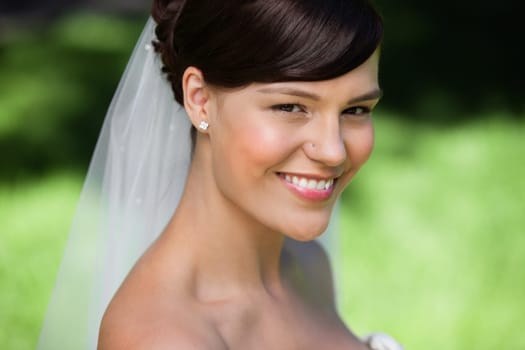 Portrait of a beautiful young bride smiling