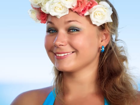 Portrait of a smiling womanl with flowers