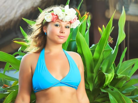 Young woman wearing wreath at the resort