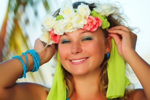 Portrait of a smiling Hawaiian girl with flowers