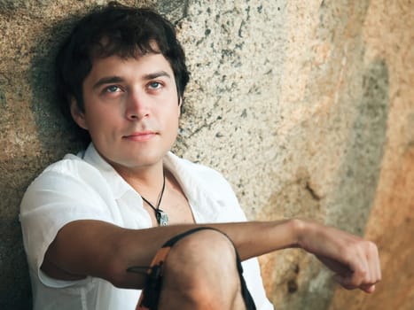 Outdoor portrait of young man of handsome presence
