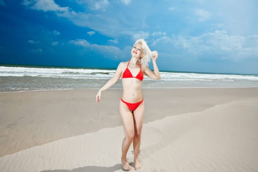 Young woman at the tropical beach