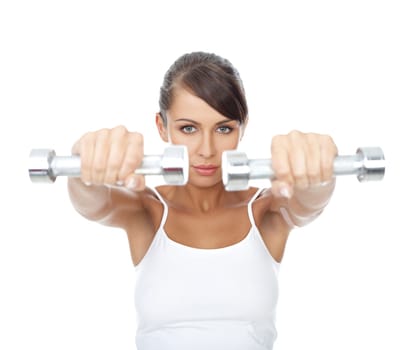 Young beautiful woman with dumb-bells in hands